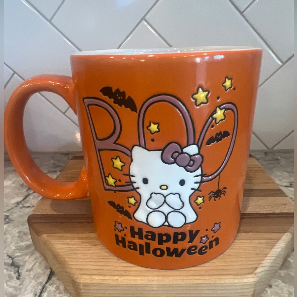 Orange Hello Kitty Halloween mug